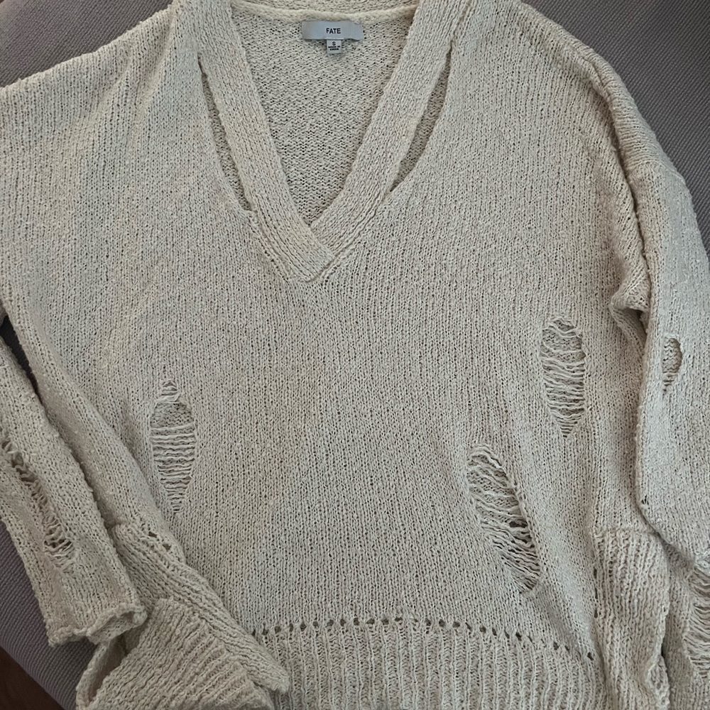 Summer distressed sweater